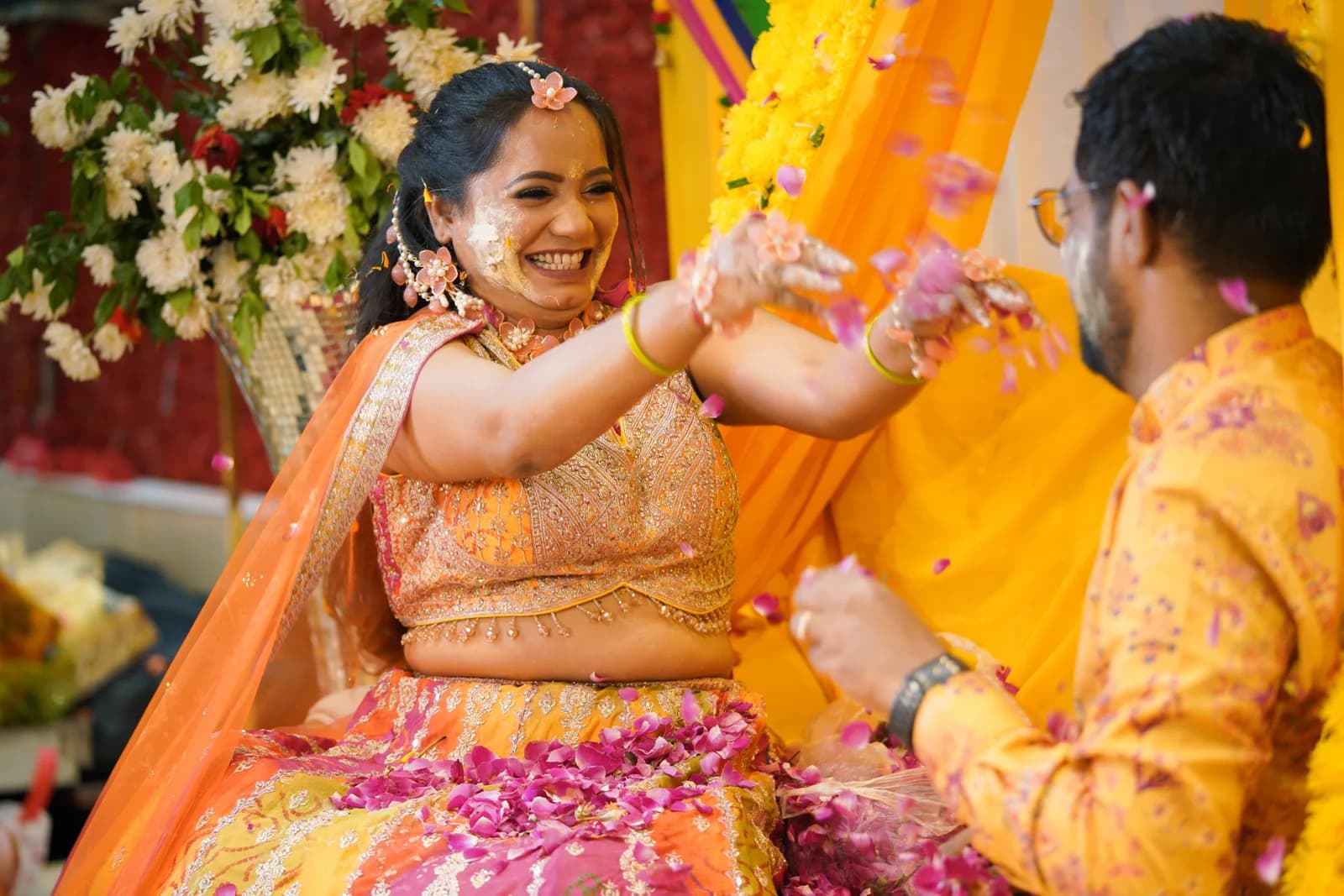 Bride in traditional lehenga and jewellery, radiant before the wedding ceremony begins.