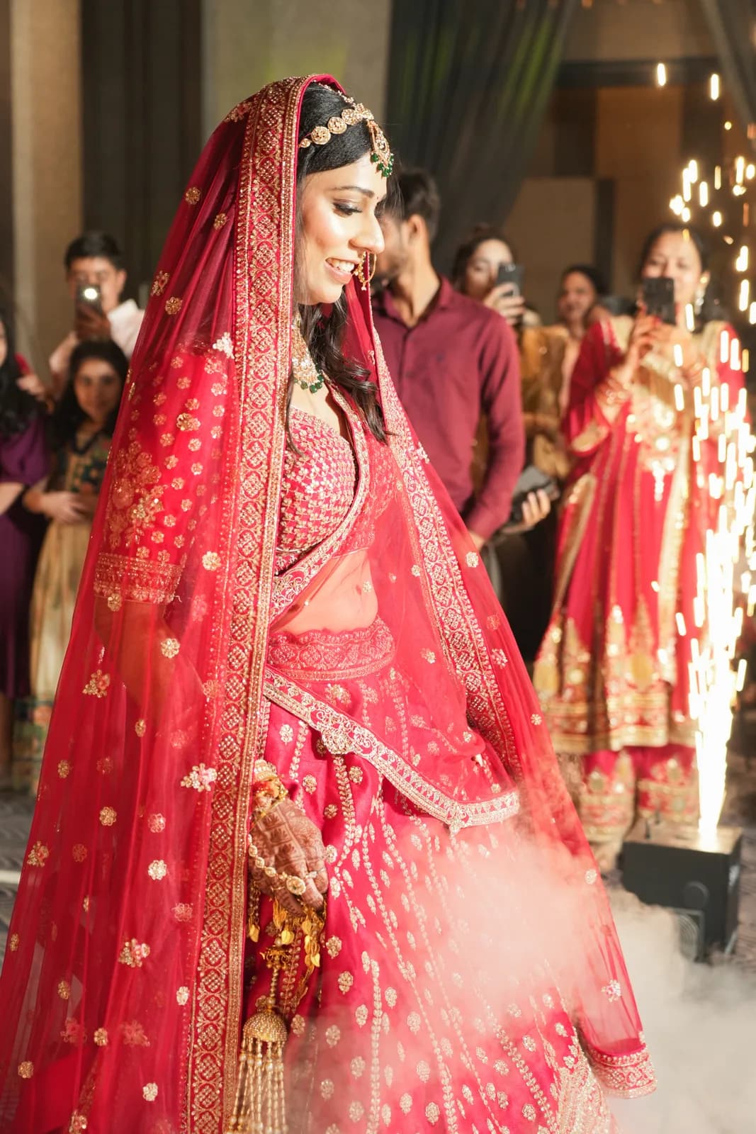 Bride in a red lehenga — bridal portrait by Lens9 Studio, New Delhi